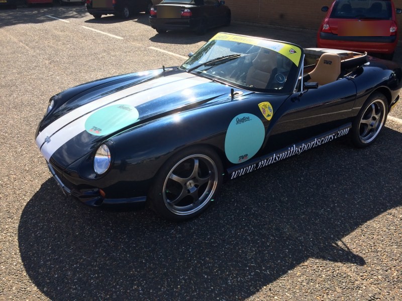 Our navy Chimaera race car with twin white stripes and Mat Smith livery