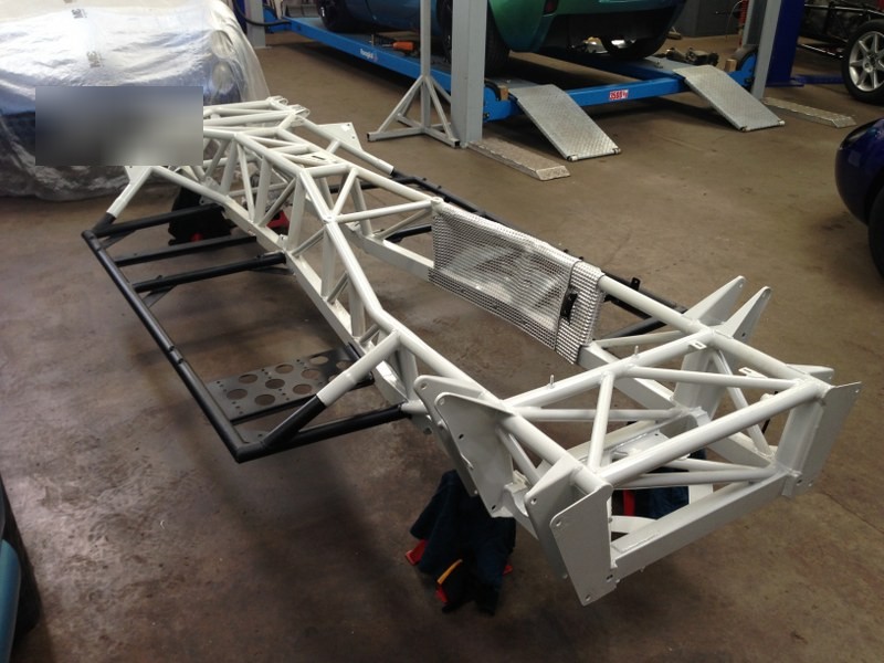 A TVR Tuscan chassis refurbished and painted white